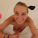 Smiling slut of a girlfriend ready to suck your cock hard.